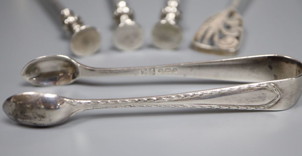 A pair of George V silver seal top serving spoons by Mappin & Webb, a silver sifter spoon, pair of silver tongs etc.